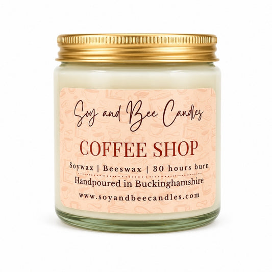 Soy and Bee Candles coffee shop scented candle with a gold lid on a white background