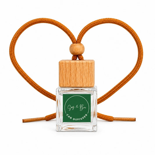 Car diffuser with wooden top and orange cord on a white background