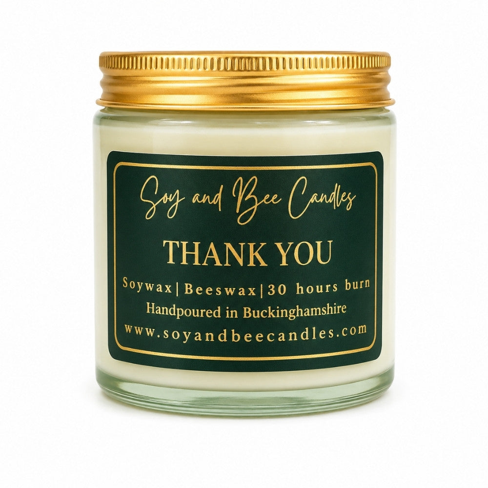 Soy and Bee Candles jar with gold lid and label on a white background