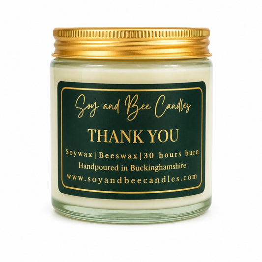 Soy and Bee Candles jar with gold lid and label on a white background